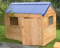 Macrocarpa weatherboard playhouse
