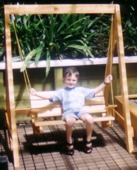 Swing chair in frame